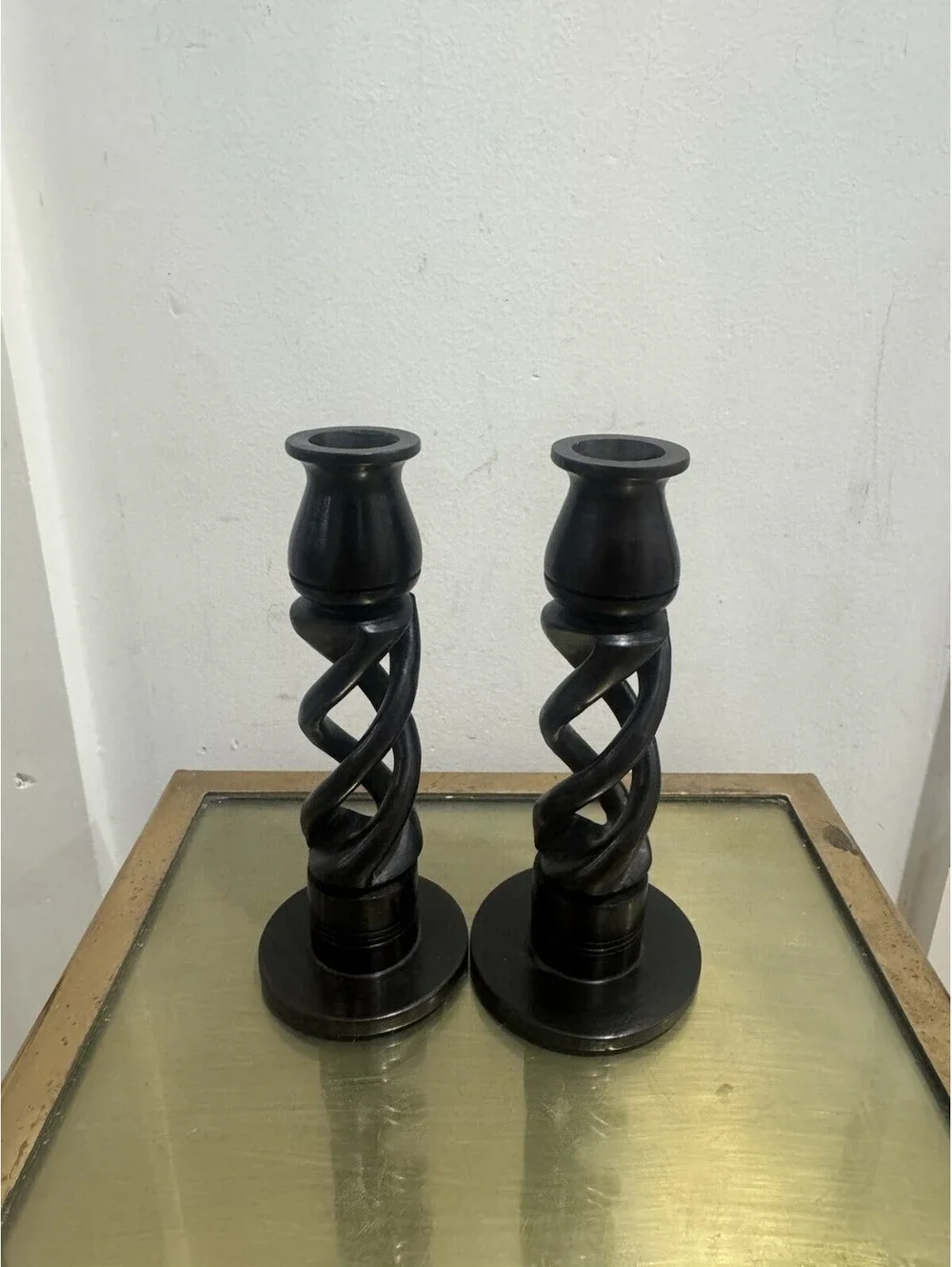 Pair of vintage hand carved African ebony twist candlesticks